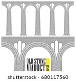 An ancient high stone viaduct. Constructed of stone and bricks a huge bridge. Even the smallest details are visible. View in profile.