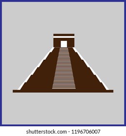 Ancient Maya pyramid with temple on top and long stairs