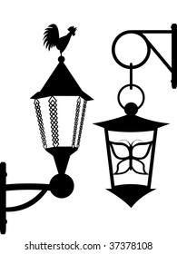 Ancient street lanterns in a vector - a silhouette on a white background