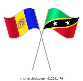 Andorran and Kittitian crossed flags. Andorra combined with Saint Kitts and Nevis isolated on white. Language learning, international business or travel concept.
