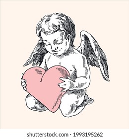 An angel holds a heart.