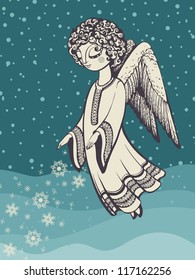 Ángel con copos de nieve