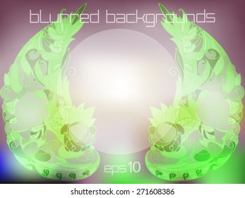 Angel wings. Green fluorescent wings composed of leaves and rose-colored in the shape of wings.