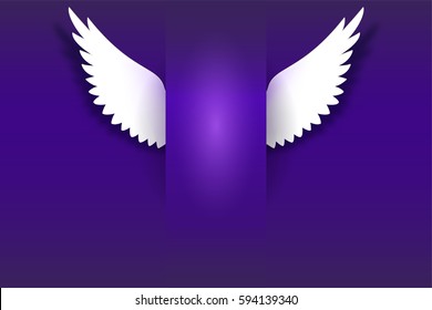 Angel wings hovering in the dark. Card with white angelic wings with place for your text