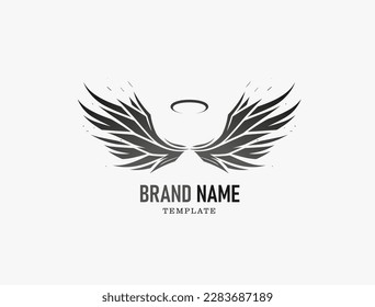 Angel wings logo with nimbus. Vector illustration