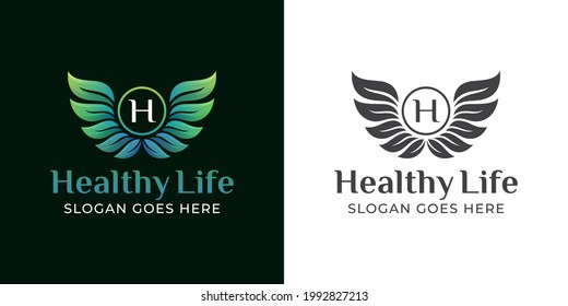 angel wings and shield   leaves for healthy life  medical treatment therapy in natural logo design
