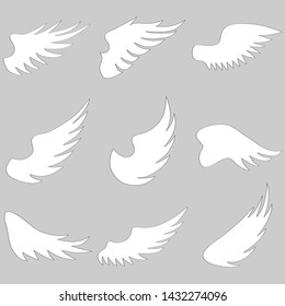 Angel wings, white angel wings isolated on gray. Vector illustration of angel wings.