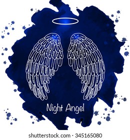 Angel's wings and nimbus on watercolor background