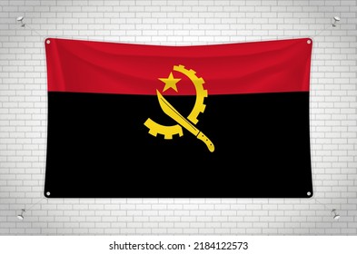 Angola flag hanging on brick wall. 3D drawing. Flag attached to the wall. Neatly drawing in groups on separate layers for easy editing.