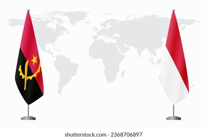 Angola and Monaco flags for official meeting against background of world map.