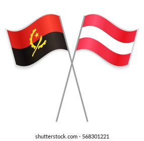 Angolan and Austrian crossed flags. Angola combined with Austria isolated on white. Language learning, international business or travel concept.