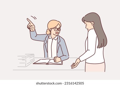 Angry boss fires employee sitting at table and pointing finger to side to drive away colleague who made mistake. Boss yelling at subordinate for lack of performance and lack of sales