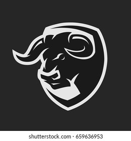Angry bull, monochrome logo on a dark background.