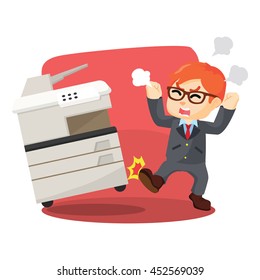 Angry businessman kicking photocopy machines