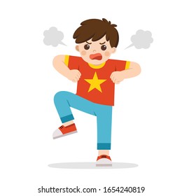 Angry expression. The boy is expressing anger. Angry child standing in a pose frowning, screaming, grinning and pumping fists. Bullying child.