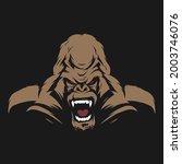 Angry gorilla face on black background