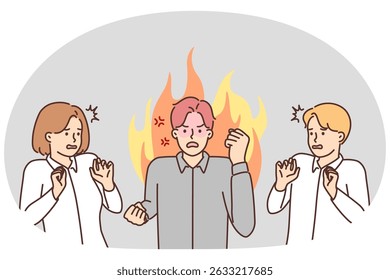 Angry guy office worker swears and waves hands scaring colleagues and creating negative atmosphere in team. Annoyed man with fire behind back symbolizes boss swears on subordinates