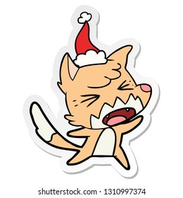 angry hand drawn sticker cartoon of a fox wearing santa hat