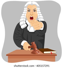 Angry judge yelling and pointing his finger at someone knocking gavel