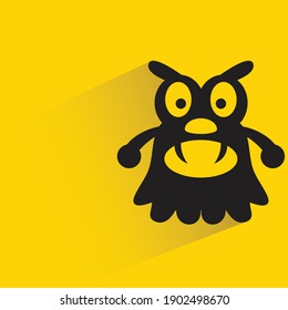 angry monster with shadow on yellow background