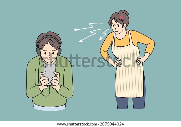 Angry mother scold lecture teen son on headphones using\
cellphone device. Mad furious mom swear teenage boy child overuse\
smartphone play online. Social media addiction. Vector\
illustration. 