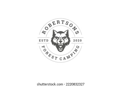 Angry roaring wolf furry head circle vintage logo design template vector illustration with place for text. Portrait aggressive wild forest carnivorous predator animal hunt brand business label