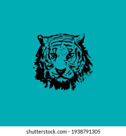 Angry Tiger Face. Black paint, ink brush strokes, brushes, lines, grunge. Freehand drawing. Tiger drawn with ink from the hands of a predator logo. Vector illustration. Isolated on green background.