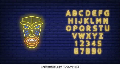 Angry tiki idol neon sign. Tribal mask, ancient culture design. Night bright neon sign, colorful billboard, light banner. Vector illustration in neon style.