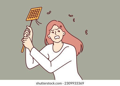 Angry woman kills mosquitoes using swatter feeling irritated due to insects disturbing sleep on summer night. Girl with swatter is annoyed by camaras and maskites and needs electric fumigator