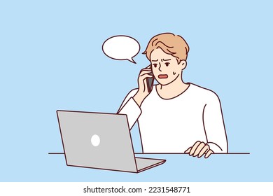 Angry young man sit at desk work on computer talk on cell about problem on device. Unhappy male experience trouble using laptop speak with helpline. Vector illustration. 