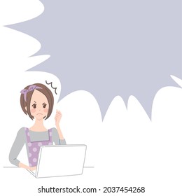 Angry young woman while operating a computer