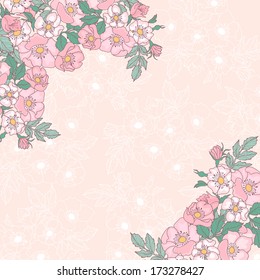 angular frame of dog-rose. blossoming branch in the spring garden on a romantic background