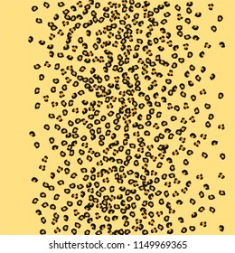Animal background with leopard spots. Imitation of a leopard skin.