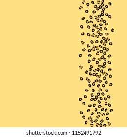 Animal background with leopard spots. Imitation of a leopard skin.