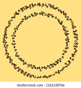 Animal background with leopard spots. Imitation of a leopard skin.