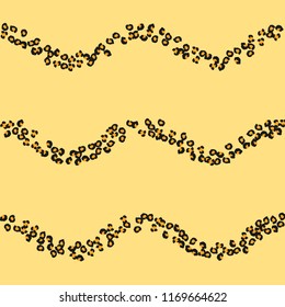 Animal background with leopard spots. Imitation of a leopard skin.