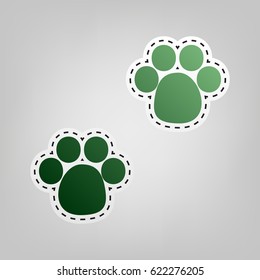 Animal footprint sign illustration. Vector. Green icon with outline for cutting out at gray background.