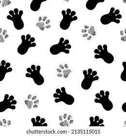 Animal footprints seamless pattern. Paw prints of dogs and rabbits. Vector background