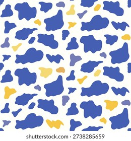 Animal pattern with blue and yellow cowhide blobs. Seamless vector design has uneven spots and patch-shaped motifs in vibrant colors. Abstract amoeba spots. Camouflage cow animal print.