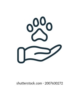 Animal Paw And Human Hand Linear Icon. Animal Donation, Care And Protection Concept. Adoption Of Pets, Shelter, Charity Line Icon. Animal Welfare Pictogram. Editable Stroke. Vector Illustration.