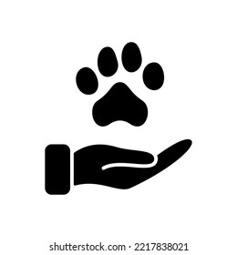 Animal Paw and Human Hand Silhouette Icon. Animal Donation, Care and Protection concept. Adoption of Pets, Shelter, Charity Icon. Animal welfare Pictogram. Vector illustration.