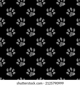 Animal paw print seamless black and white pattern. Vector hand-drawn background.