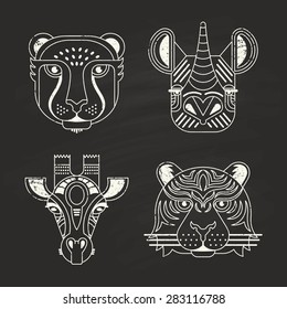 Animal portraits made in unique geometrical flat style. Vector heads of cheetah, rhino, giraffe and tiger on chalkboard. Isolated icons for your design.  