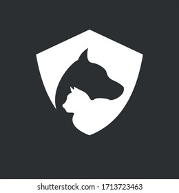 animal protection using cat and dog silhouette in shield vector illustration design