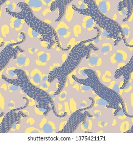 Animal seamless pattern. Leopard silhouettes background in a geometric print. Leopard spots fur background. Good for textile, fabric, apparel or wrapping.