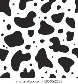 Animal seamless pattern and textile design. Black spots on white background. Vector illustration with cow skin texture or dalmatian dog stains. Good for fabric print, cards, wrapping, wallpapers.