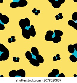Animal seamless pattern. Vector illustration for fabric, wallpaper, etc. Blue leopard print on bright yellow background