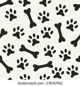 Animal seamless vector pattern of paw footprint and bone. Endless texture can be used for printing onto fabric, web page background and paper or invitation. Dog style. Black and white colors.