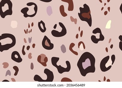 Animal skin abstract print seamless pattern. Leopard spots on an ash pink background, safari in Africa. Trendy vector design for printing on wallpaper, fabric, cover