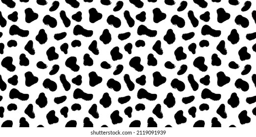 Animal skin with black ink hand drawn spots seamless pattern. Texture fur leopard or cheetah vector illustration.	
